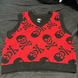 Red vest with black skeletons